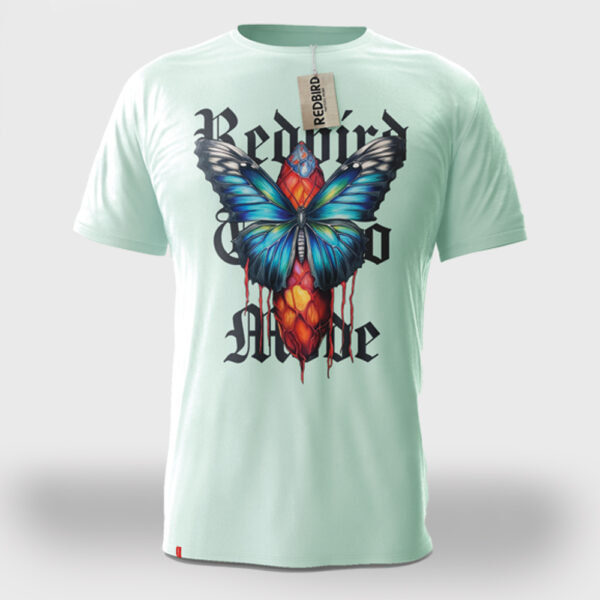 Schmetterling Kokon Bunt Tattoo Unisex T-Shirt von Redbird Tattoo Mode in Mint Grün. Von XS-3XL. großer print auf der vorderseite und ein kleiner print auf der rückseite