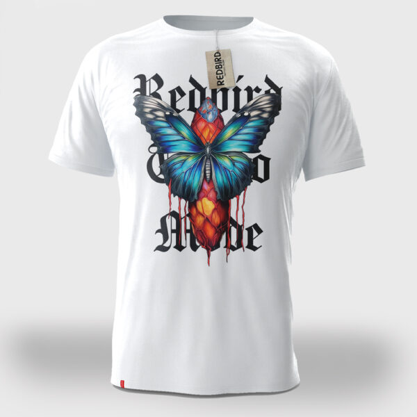Schmetterling Kokon Bunt Tattoo Unisex T-Shirt von Redbird Tattoo Mode in weiß. Von XS-3XL. großer print auf der vorderseite und ein kleiner print auf der rückseite
